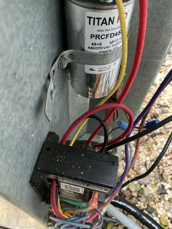 Completed routine maintenance on two air conditioning units and one furnace system under membership plan. Inspected electrical components including TITAN PRCFD45 motor run capacitor (45+5 MFD, 440/370 VAC), contactor assembly, and associated wiring connections. Performed amperage readings using clamp meter to verify proper system operation and confirmed all units functioning within normal parameters.
