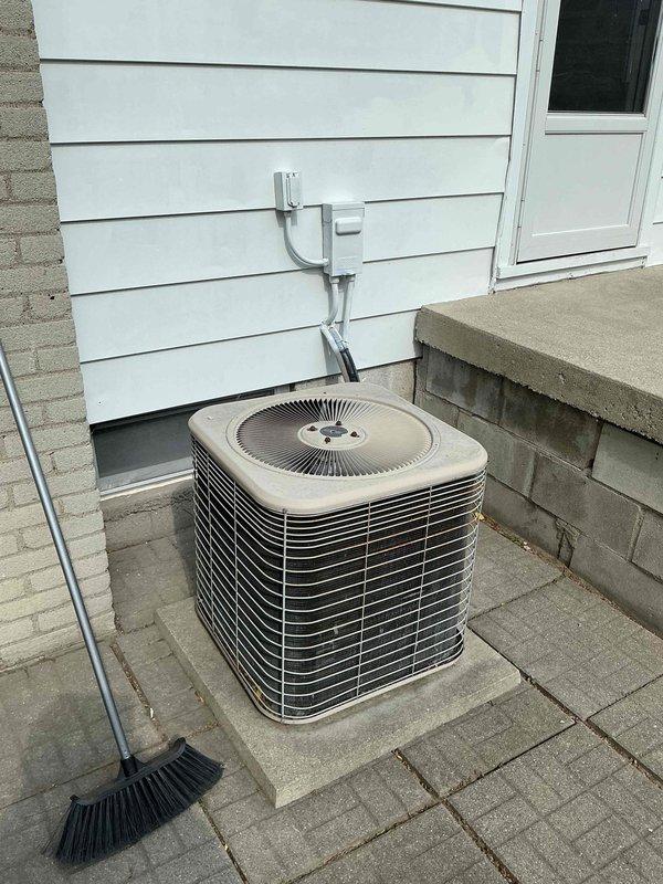 Completed comprehensive cooling maintenance on 22-year-old residential air conditioning system during scheduled service window. Performed standard MVP maintenance protocol on outdoor condensing unit, including inspection of electrical connections at disconnect box, evaluation of refrigerant line sets and PVC protective covers, and assessment of unit mounting on concrete paver pad. Unit operational with no immediate service needs identified; customer declined renewal agreement at this time.