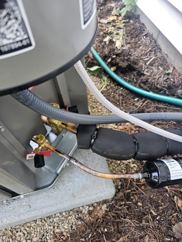 Completed callback to upgrade outdoor unit from single-stage ML-13 to two-stage ML-17KC1-036 condenser. Verified all refrigerant line connections, electrical conduit installation, and proper unit placement on concrete pad with secure mounting. System tested and operating within manufacturer specifications.
