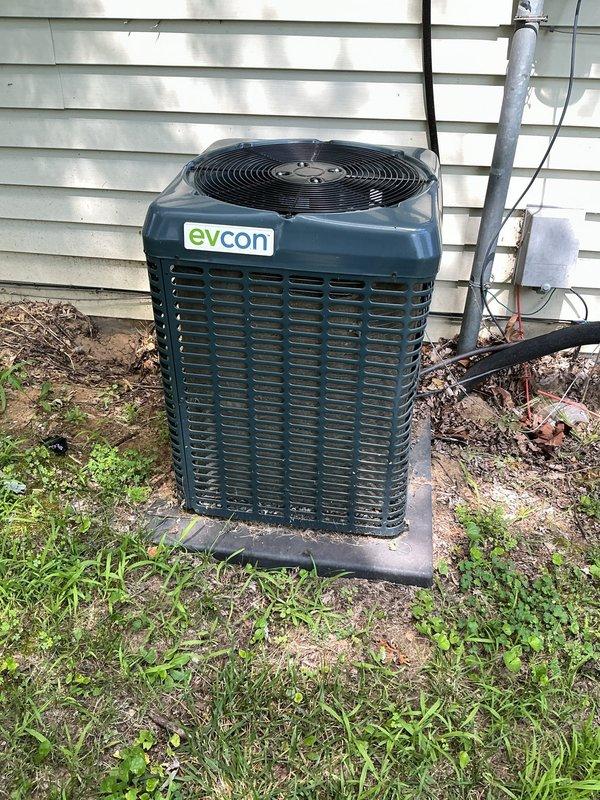 Completed preventative maintenance tune-up on 10-year-old Evcon air conditioning system. Performed standard inspection of outdoor condenser unit and interior ductwork, verified proper operation of all components, checked refrigerant levels, cleaned condenser coils, and inspected electrical connections and insulated duct runs for proper airflow and system efficiency.
