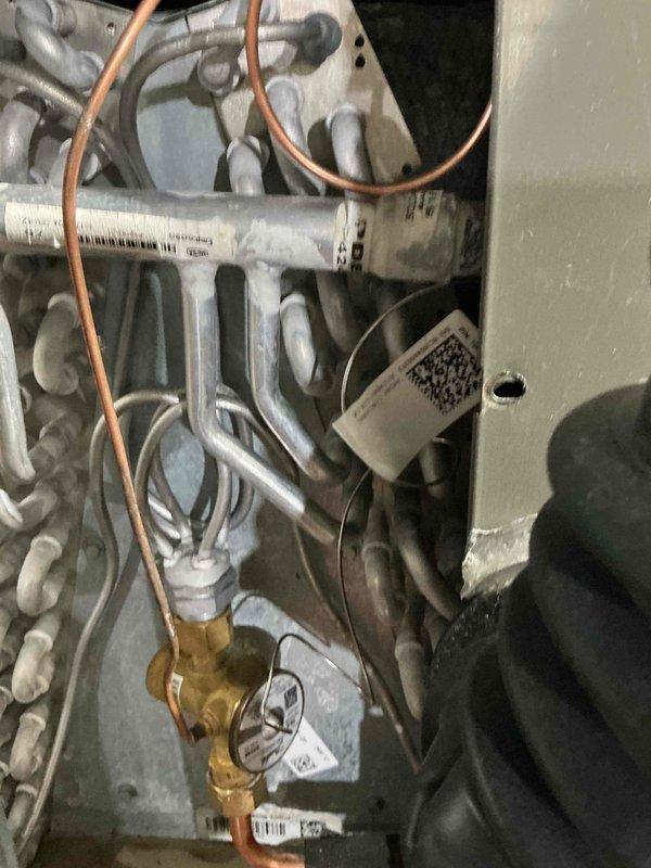 Completed preventive maintenance tune-up on one-year-old residential HVAC system. Performed comprehensive inspection of furnace/air handler unit, verified proper operation of all mechanical components, checked refrigerant lines and heat exchanger coils, and inspected ductwork connections for secure installation and proper airflow. All components found to be functioning within normal parameters with no issues identified.