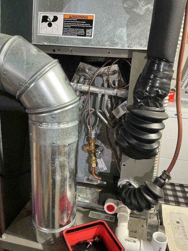 Completed preventive maintenance tune-up on one-year-old residential HVAC system. Performed comprehensive inspection of furnace/air handler unit, verified proper operation of all mechanical components, checked refrigerant lines and heat exchanger coils, and inspected ductwork connections for secure installation and proper airflow. All components found to be functioning within normal parameters with no issues identified.