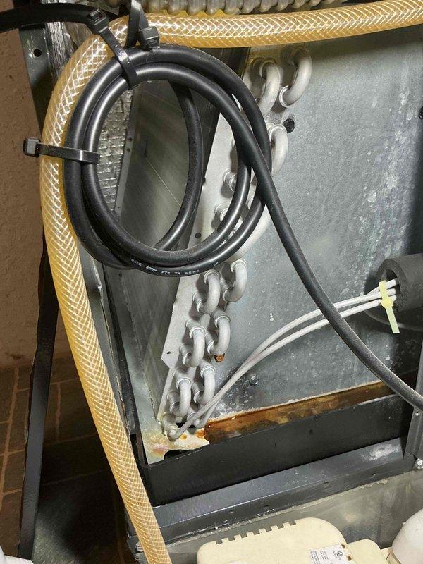 Completed routine tune-up maintenance on a 6-year-old ground-level HVAC system. Inspected internal components including evaporator coil, refrigerant lines, condensate drain system, and electrical connections; all components found to be in proper working condition with normal wear for equipment age. System tested and confirmed operating within manufacturer specifications.
