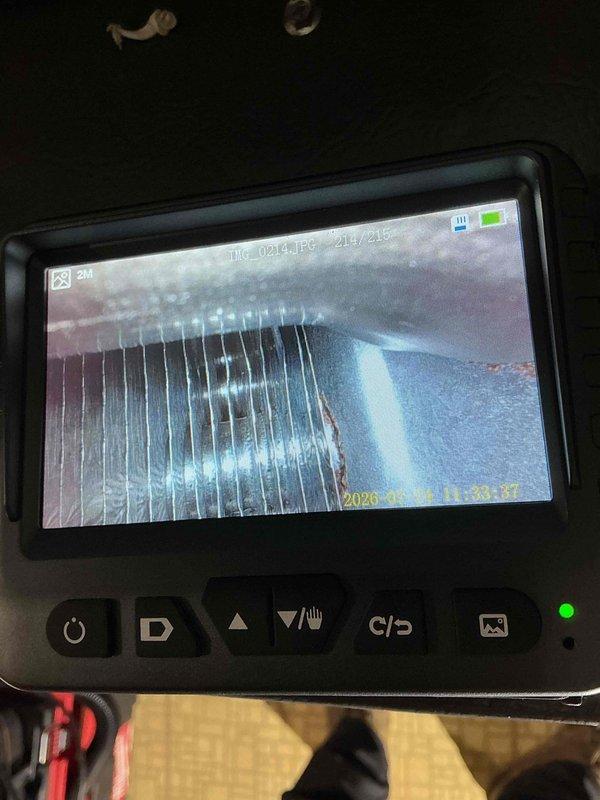 Completed comprehensive tune-up service on 10-year-old furnace and air conditioning system. Performed visual inspection of ductwork using electronic camera inspection device to assess interior condition of flexible duct components, checked all mechanical connections, verified proper venting through PVC exhaust pipes, and ensured condensate drainage system functioning correctly. All equipment operating within manufacturer specifications with no immediate service concerns identified.