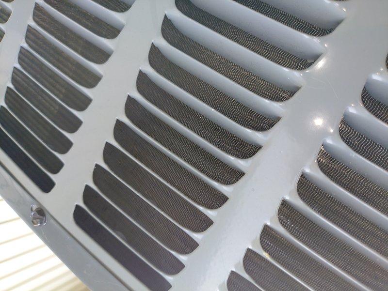 Responded to no cooling complaint on 5-year-old residential air conditioning system. Upon arrival, confirmed outdoor condensing unit fan motor was not operating and system was delivering lukewarm air to living space. Performed diagnostic assessment of outdoor unit, inspecting condenser fan motor, start/run capacitor, and contactor operation. Inspected condenser coil condition through protective grille, noting clean fins and adequate airflow passages. Identified failed component preventing proper heat rejection from refrigeration system. Replaced defective part, restored power to unit, and verified proper fan motor operation and amperage draw. Cycled system through complete cooling cycle, confirmed adequate airflow across condenser coil, and verified cold air delivery at supply registers. Unit restored to normal cooling operation with all safety controls functioning properly.