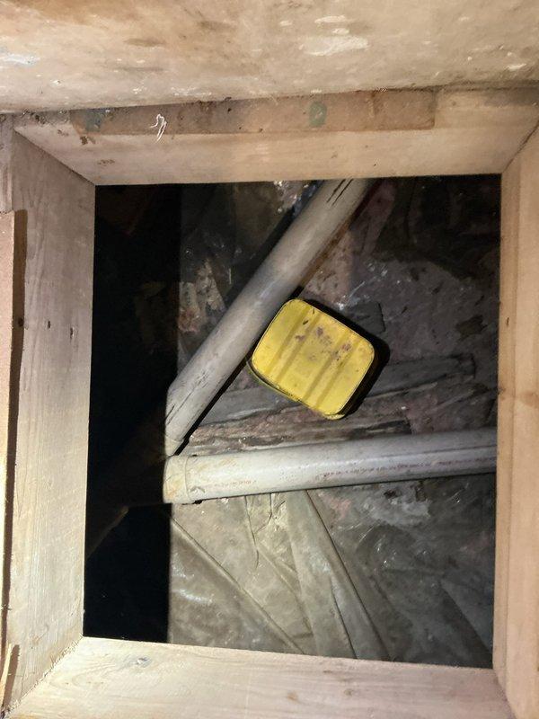 Responded to no-cool call on 20-year-old air conditioning system with outdoor unit not operating. Upon arrival, performed diagnostic assessment of system components and electrical connections. Inspected outdoor condensing unit, verified power supply, and checked indoor air handler operation. Accessed HVAC equipment through interior utility space to examine ductwork connections and control wiring. Documented existing conditions of aged system components showing significant wear and accumulated debris consistent with two decades of operation. Provided customer with findings regarding outdoor unit failure and discussed available options for repair versus replacement given the advanced age of the equipment.