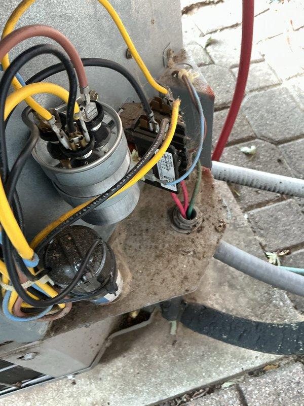 Responded to service call for air conditioning system not cooling with condenser failing to start properly. Diagnosed failed dual run capacitor preventing compressor from operating while indoor blower continued to function normally. Replaced defective capacitor with new unit, tested system operation, and verified proper compressor start-up and cooling cycle restoration.
