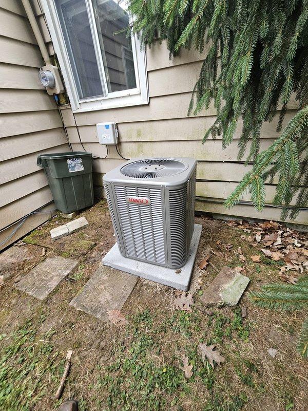 Completed full HVAC system installation including Lennox single-stage condenser unit and downflow cased evaporator coil. Due to space constraints in utility closet, installed shorter coil with maximum 16-inch height clearance to accommodate existing furnace configuration. Relocated condenser unit 3 feet from gas meter on new concrete pad for proper clearance and code compliance. Ran new refrigerant line set connecting outdoor condenser to indoor coil. Installed new thermostat for system control. All components properly sized and installed per manufacturer specifications. System tested and operational upon completion.