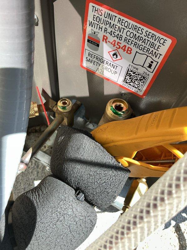 Responded to callback for unusual noises in ductwork and loud operational sounds from system installed in April 2024. Performed diagnostic inspection of outdoor unit, checking refrigerant service ports, electrical connections, and capacitor assembly. System found to be operating within normal parameters with proper refrigerant charge (R454B) and all electrical components functioning correctly. Verified capacitor connections secure and all wire terminations tight. No mechanical defects or loose components identified that would cause reported noise concerns. Recommended monitoring system operation and potential ductwork inspection to identify source of acoustic transmission.