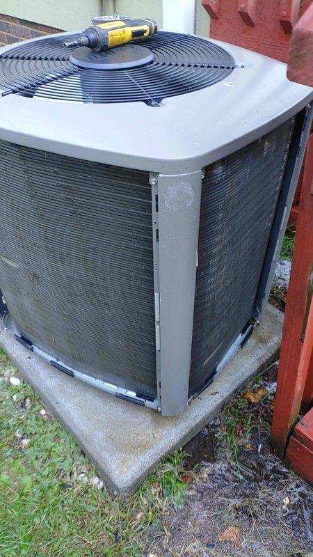 Completed scheduled maintenance on a 4-year-old air conditioning system. Inspected outdoor condensing unit, verified proper operation of compressor and condenser fan, checked refrigerant pressures, and examined indoor heating components including heat exchanger and gas valve assembly. All components found to be functioning within normal parameters with routine cleaning performed on outdoor unit.