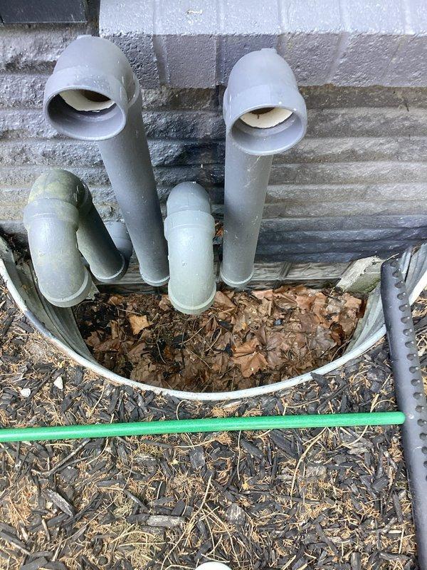 Conducted comprehensive assessment of existing HVAC system for complete air conditioning replacement. Evaluated current RUUD condenser unit and associated equipment including evaporative cooler, PVC drainage system, and exterior mechanical components. Documented existing installation configuration, noting foundation-mounted equipment placement, drainage piping arrangement, and electrical connections. Provided detailed replacement estimate for new AC system with agreement to credit previously installed fan motor toward total equipment upgrade cost upon customer approval.