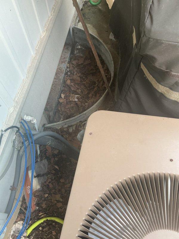 Responded to service call for non-operational AC unit producing buzzing noise with inoperative fan motor. Upon arrival, inspected 15-year-old outdoor condenser unit and diagnosed failed capacitor preventing fan motor from starting. Replaced defective dual run capacitor, tested system operation, and verified proper fan rotation and compressor engagement. Unit restored to full operational status with normal cooling cycle achieved.