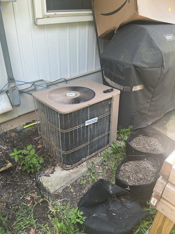 Responded to service call for non-operational AC unit producing buzzing noise with inoperative fan motor. Upon arrival, inspected 15-year-old outdoor condenser unit and diagnosed failed capacitor preventing fan motor from starting. Replaced defective dual run capacitor, tested system operation, and verified proper fan rotation and compressor engagement. Unit restored to full operational status with normal cooling cycle achieved.