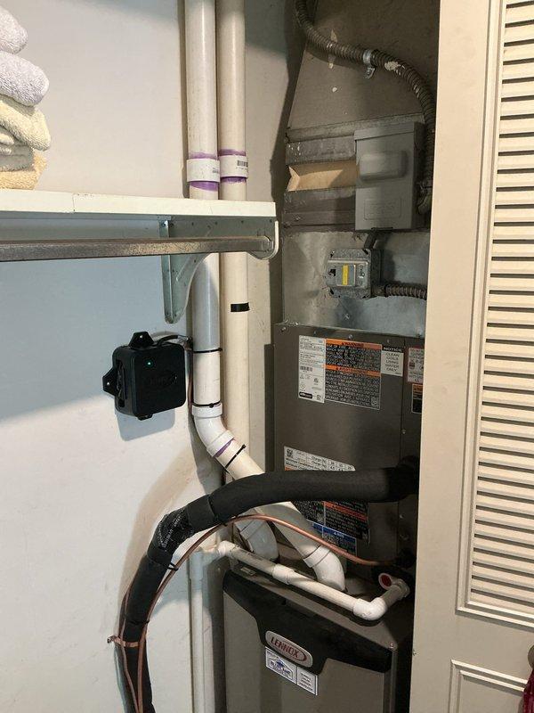 Completed full air conditioning system replacement including removal of existing Lennox evaporator coil and outdoor condensing unit. Installed new evaporator coil (17.5" W x 21.5" L) retrofitted to existing supply plenum (16.5" W x 20" L) and connected to existing ductwork and 2" venting system. Installed new outdoor condensing unit on freshly placed equipment pad with new refrigerant line sets running from indoor coil to outdoor unit. Upgraded electrical service including new disconnect box and electrical whip to outdoor unit. Ran new thermostat wire from indoor unit to wall-mounted thermostat and installed new programmable thermostat for system control. System tested, refrigerant charge verified, and all components confirmed operational.