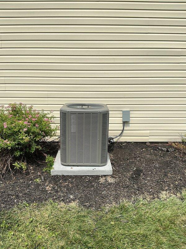 Completed full air conditioning system replacement including removal of existing Lennox evaporator coil and outdoor condensing unit. Installed new evaporator coil (17.5" W x 21.5" L) retrofitted to existing supply plenum (16.5" W x 20" L) and connected to existing ductwork and 2" venting system. Installed new outdoor condensing unit on freshly placed equipment pad with new refrigerant line sets running from indoor coil to outdoor unit. Upgraded electrical service including new disconnect box and electrical whip to outdoor unit. Ran new thermostat wire from indoor unit to wall-mounted thermostat and installed new programmable thermostat for system control. System tested, refrigerant charge verified, and all components confirmed operational.