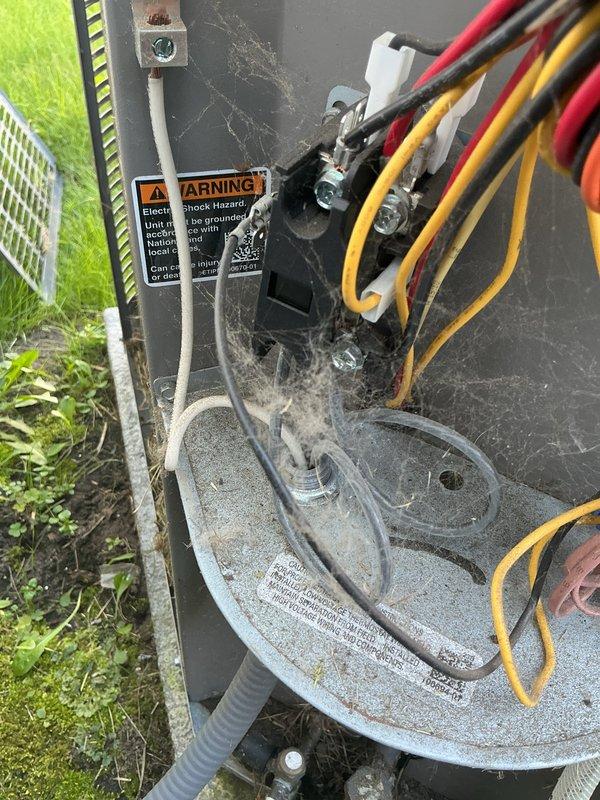 Completed routine cooling maintenance on outdoor air conditioning unit. Inspected electrical connections, disconnect box, and fuses, noting significant accumulation of dirt, dust, and debris within the service panel and around internal components. Verified all electrical connections were secure at terminal blocks, checked disconnect box fuses for proper operation, and confirmed unit operational status per standard maintenance protocol.