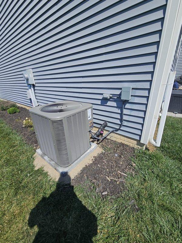 Completed warranty service on new HVAC installation. Replaced customer-supplied thermostat that was non-functional with a new working unit after temporarily installing the previous thermostat. Corrected improper compressor foundation installation by adjusting and leveling the concrete pad beneath the Lennox condensing unit to ensure proper equipment support and operation.