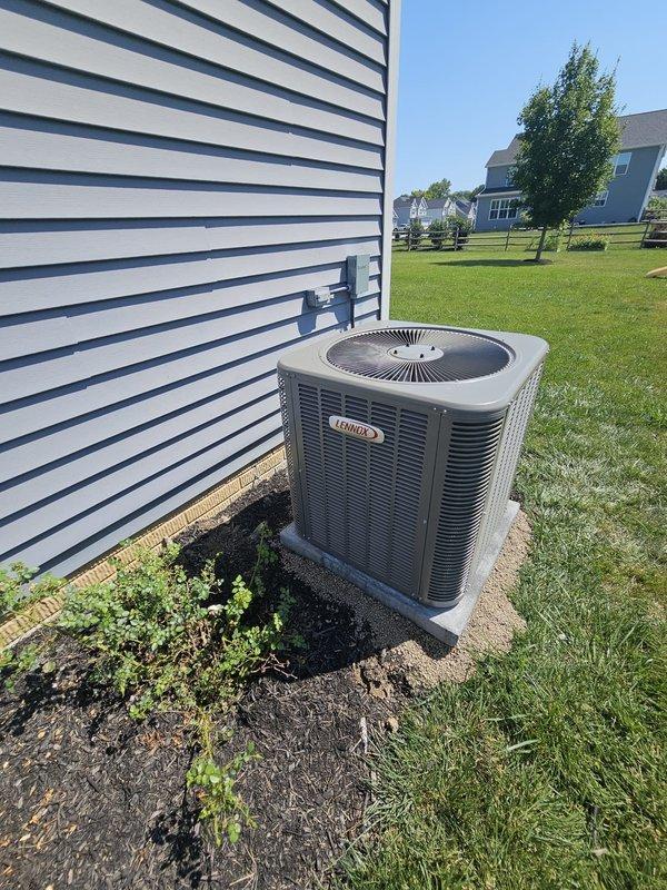 Completed warranty service on new HVAC installation. Replaced customer-supplied thermostat that was non-functional with a new working unit after temporarily installing the previous thermostat. Corrected improper compressor foundation installation by adjusting and leveling the concrete pad beneath the Lennox condensing unit to ensure proper equipment support and operation.