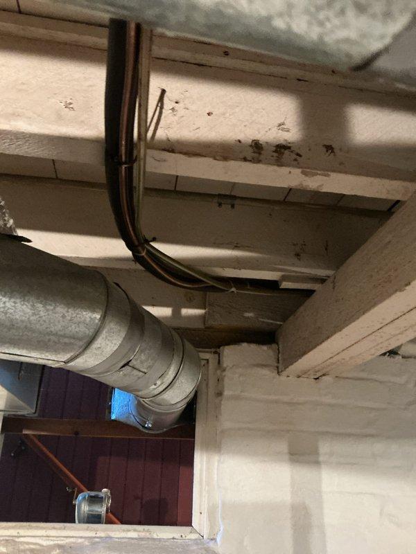 Responded to no cooling call for system over 10 years old. Upon arrival, performed diagnostic inspection of HVAC equipment and accessible components in basement utility area. Documented existing conditions of ductwork, electrical wiring, and surrounding infrastructure showing age-related wear and environmental exposure typical of older installations.