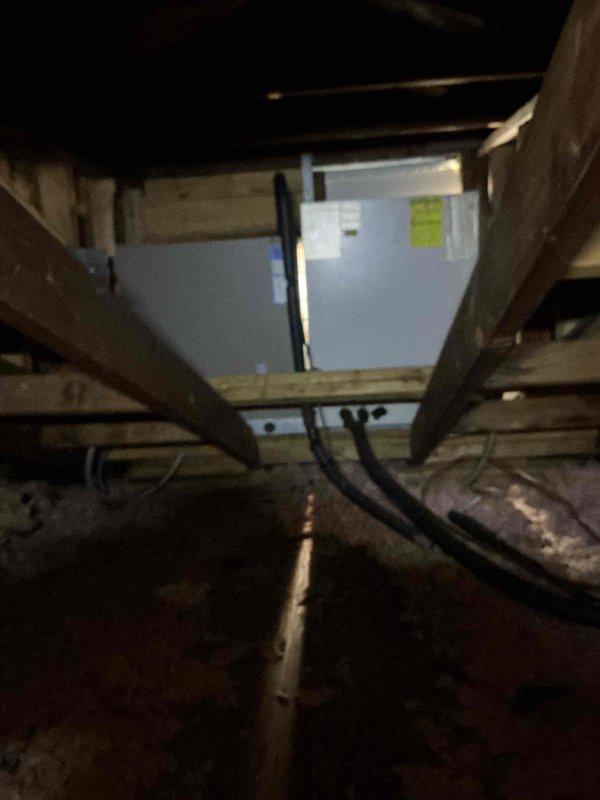 Responded to service call for air conditioning unit not producing cold air. Accessed unit located in crawl space beneath structure and inspected HVAC system, including air handler and associated components. Performed diagnostic assessment of system operation, checked refrigerant levels, electrical connections, and airflow. Inspected attic space to verify proper insulation and ductwork configuration. Unit restored to proper cooling operation.