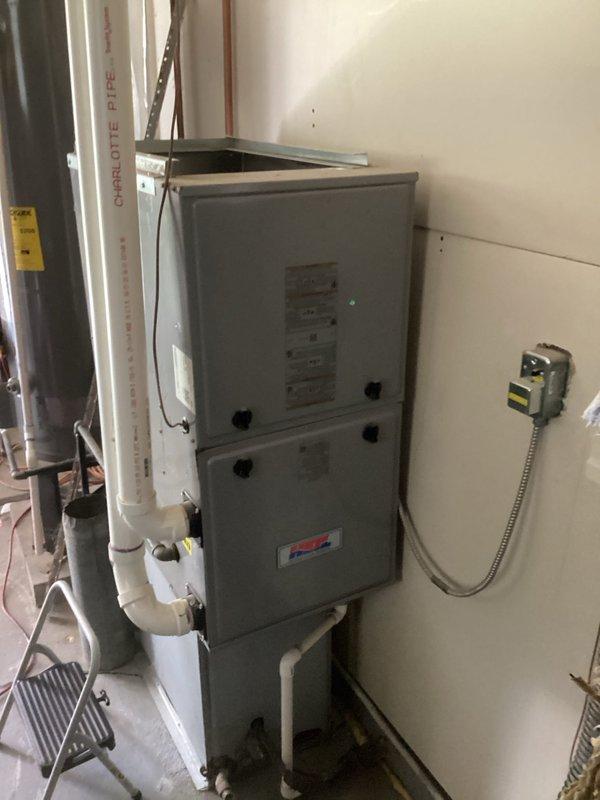 Completed return air duct installation for newly installed furnace in garage area. Routed ductwork through attic space utilizing existing structural pathways, installed rigid rectangular ductwork with proper insulation to ensure efficient airflow and minimize thermal loss. Connected return air system to furnace unit, verified proper sealing at all connections, and ensured compliance with local HVAC codes for residential ductwork installation.