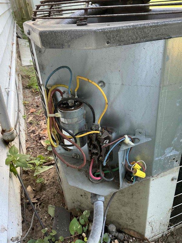 Completed comprehensive cooling system maintenance and tune-up on residential central air conditioning unit. Performed thorough inspection of condenser unit exterior, verified proper clearance from vegetation and obstructions, and accessed electrical compartment to inspect capacitor, wiring connections, and internal components. All electrical connections were examined for proper termination and signs of wear, capacitor tested for proper functionality, and condensate drain line confirmed operational. System evaluated for age-related wear with components showing normal weathering consistent with outdoor installation.