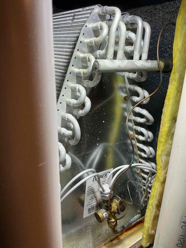Completed comprehensive tune-up service on 9-year-old furnace and air conditioning system. Performed standard maintenance procedures including inspection of evaporator coil assembly, refrigerant lines, and heat exchanger components. All systems tested and verified operational with no issues identified during the early morning service call.