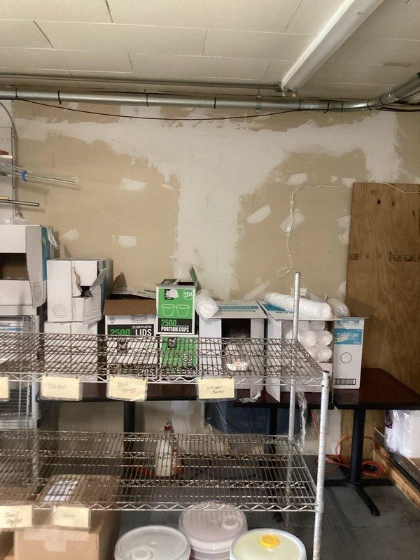 Provided estimate for mini split installation in party room storage area with exposed ductwork and drop ceiling. Assessed interior space configuration, electrical service access at exterior wall, and optimal placement for indoor and outdoor unit components to ensure efficient climate control for the designated area.