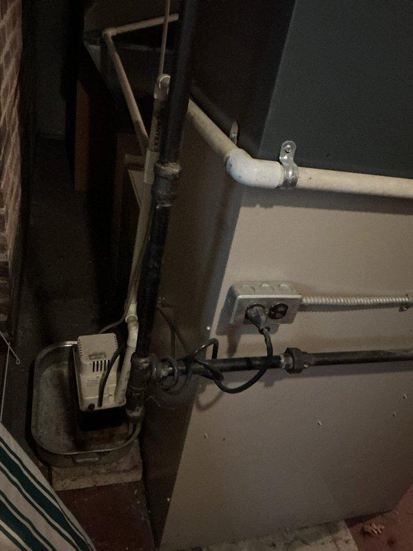 Responded to no-cooling complaint on 16-year-old air conditioning system. Upon arrival, performed diagnostic evaluation of outdoor condensing unit and indoor components. Inspected refrigerant lines, electrical connections, and condensate removal system. Documented existing equipment condition showing significant age-related wear, including corroded chain components and weathered exterior panels. Evaluated system operation, identified failure points, and provided assessment of repair versus replacement options given the unit's age and overall condition.