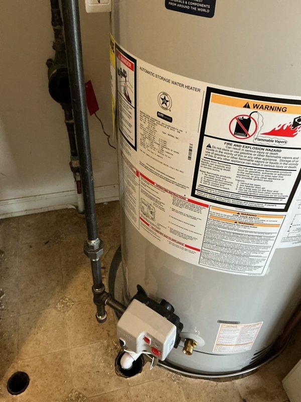 Completed full HVAC system installation including a 50-gallon Bradford White power vent water heater with recirculation pump. All copper and PVC plumbing connections were professionally installed with proper mounting brackets, pressure relief valve, and venting system secured according to manufacturer specifications.