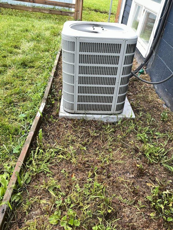 Responded to no-cooling complaint on 9-year-old Ducane 3-ton central A/C unit, Model 4AC13L36P-11A. Replaced blown 25A condenser fuse and restored power to outdoor unit. Upon startup attempt, observed house lights flickering and dimming, indicating excessive current draw, with unit still failing to cool. Diagnosed compressor locked rotor or internal electrical fault causing high amperage draw and preventing normal operation. Recommended compressor replacement or full condenser unit replacement due to age and repair costs.