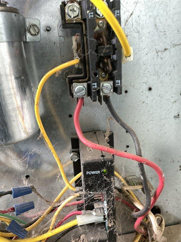 Responded to no-cooling call on 16-year-old central air conditioning system. Upon arrival, confirmed outdoor condenser unit was not energizing when thermostat called for cooling, while indoor blower operated normally. Performed electrical diagnostics at outdoor unit using clamp meter to test voltage and amperage at contactor and control circuits. Found contactor coil failed to energize due to loss of 24V control signal. Cleaned accumulated debris and cobwebs from electrical components. Tested and verified proper voltage at disconnect, confirmed capacitor readings within specification, and checked all wire connections for integrity. Replaced defective contactor, restored power, and cycled system through multiple cooling calls to verify proper operation. Unit now engaging on demand with normal compressor amperage draw and adequate airflow across condenser coil.
