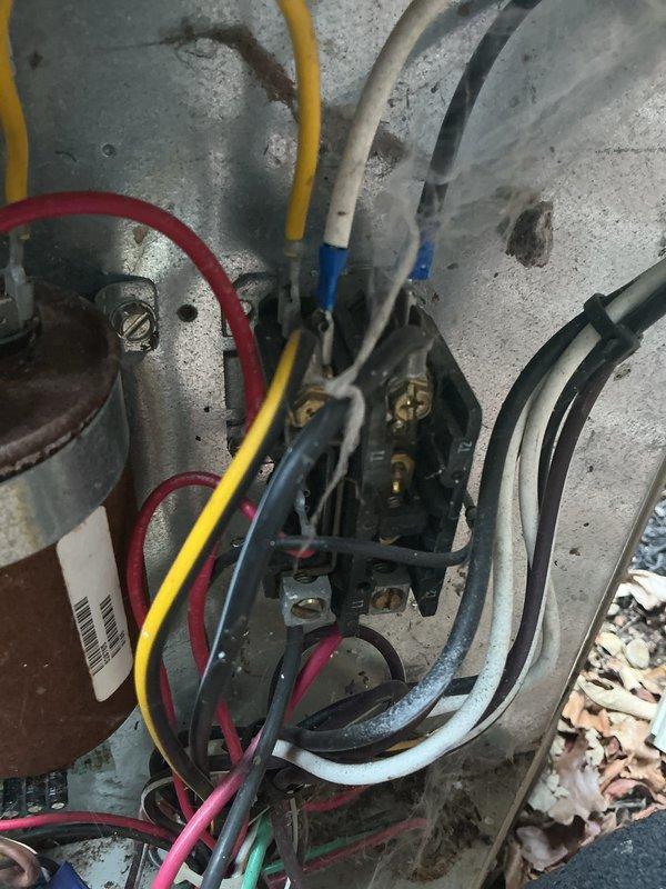 # HVAC Tune-Up Completed

Performed comprehensive tune-up on 25-year-old ground-level air conditioning unit. Connected refrigerant manifold gauge set and recorded system pressures and temperatures, verifying proper refrigerant charge and system operation. Inspected electrical connections at contactor and terminal block, confirming all wire terminations were secure and properly insulated with heat shrink tubing where appropriate.