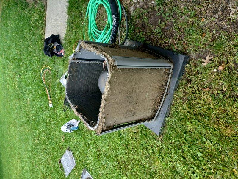 Performed annual maintenance on 1-year-old air conditioning system at vacant unit. Measured refrigerant pressures using manifold gauges, which showed readings within normal operating range. Inspected condenser unit exterior and internal components including coils and heat exchanger, noting accumulated debris and dust on surfaces that will require cleaning during future service visits.