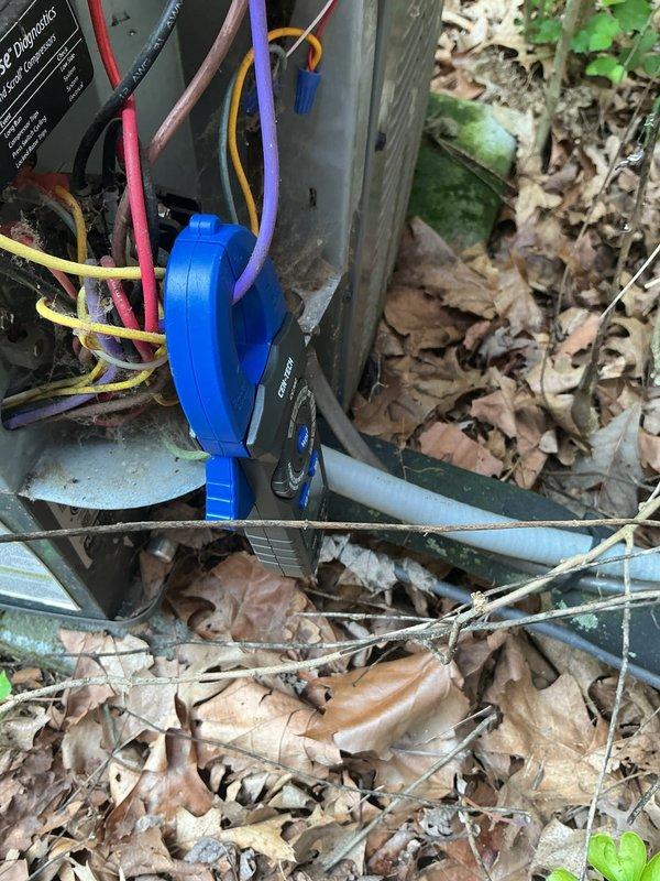 Responded to no cooling complaint on 9-year-old air conditioning system with indoor temperature at 80 degrees. Customer reported hearing blower operation but no airflow from registers. Upon inspection, accessed outdoor condensing unit and found failed dual run capacitor preventing compressor from starting. Replaced defective capacitor with proper OEM replacement, verified correct microfarad ratings for both compressor and condenser fan motor. Tested system operation, confirmed compressor startup, proper refrigerant pressures, and adequate airflow at supply registers. System restored to normal cooling operation.