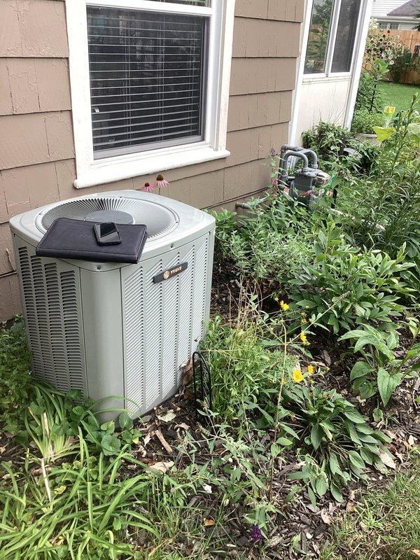 Conducted comprehensive assessment of existing HVAC system including outdoor air conditioning condenser unit and indoor Lennox furnace installation. Evaluated current equipment condition, measured system specifications, documented equipment model and serial numbers, and photographed existing installations to provide accurate replacement estimate. Assessed ductwork configuration, clearance requirements, and existing utility connections to determine optimal replacement equipment sizing and installation parameters for both cooling and heating systems.