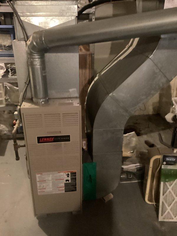 Conducted comprehensive assessment of existing HVAC system including outdoor air conditioning condenser unit and indoor Lennox furnace installation. Evaluated current equipment condition, measured system specifications, documented equipment model and serial numbers, and photographed existing installations to provide accurate replacement estimate. Assessed ductwork configuration, clearance requirements, and existing utility connections to determine optimal replacement equipment sizing and installation parameters for both cooling and heating systems.