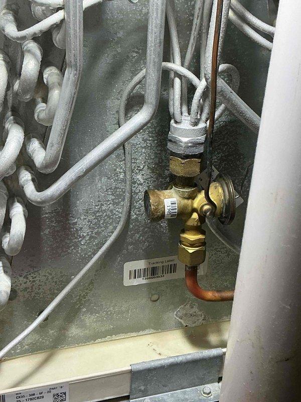 Completed routine tune-up maintenance on 6-year-old ground-level HVAC system during scheduled morning service window. Inspected heat exchanger assembly, verified proper operation of gas valve and associated copper supply lines, and confirmed all plumbing connections and fittings were secure with no signs of leakage.