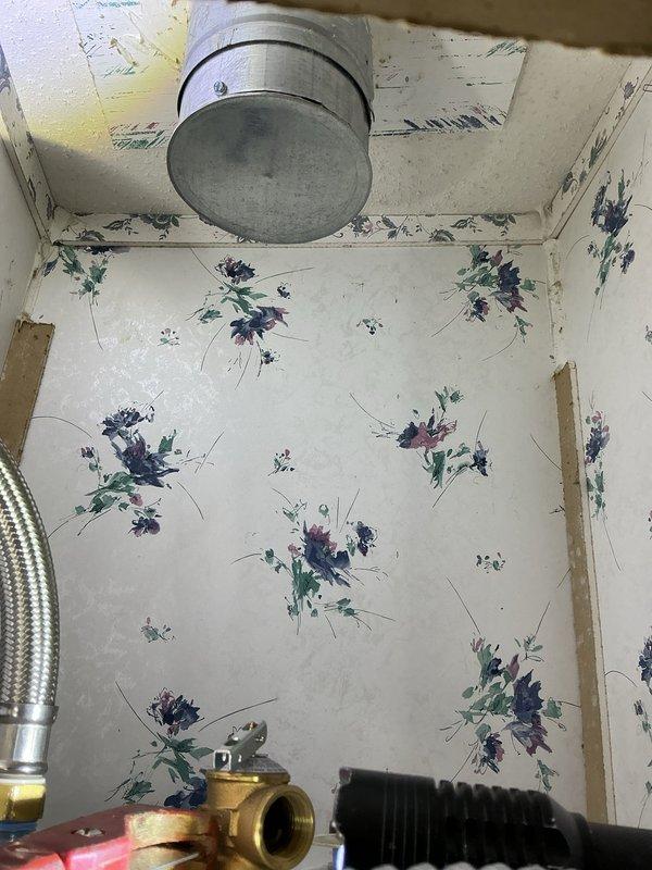 Provided estimate for conversion of existing gas-fired Bradford White water heater to new 40-gallon electric unit, including assessment of electrical supply requirements and necessary modifications to accommodate electric heating elements. Evaluated existing plumbing connections, shut-off valves, and supply lines in confined utility space for compatibility with proposed electric water heater installation and identified additional plumbing services needed to complete the conversion.