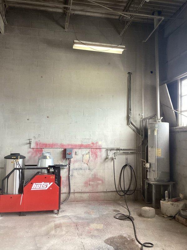 Conducted site assessment in commercial utility room to provide estimate for replacement of 8" exhaust venting system. Inspected existing ductwork and evaluated routing requirements for Hotsy pressure washing equipment exhaust. Documented current installation configuration, including overhead metal framework, ceiling structure, and proximity to water heater and other mechanical systems. Photographed equipment layout and existing venting conditions to develop accurate scope of work for complete 8" vent replacement.