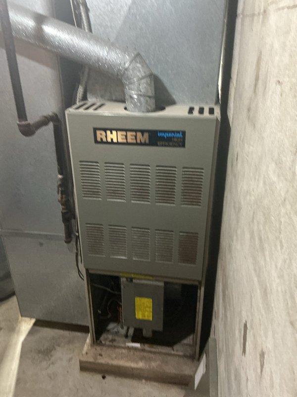 Responded to service call for non-operational A/C blower motor on Rheem furnace system. Upon inspection, diagnosed failed blower motor and completed replacement with new unit, reconnected all electrical wiring, and verified proper system operation and airflow.
