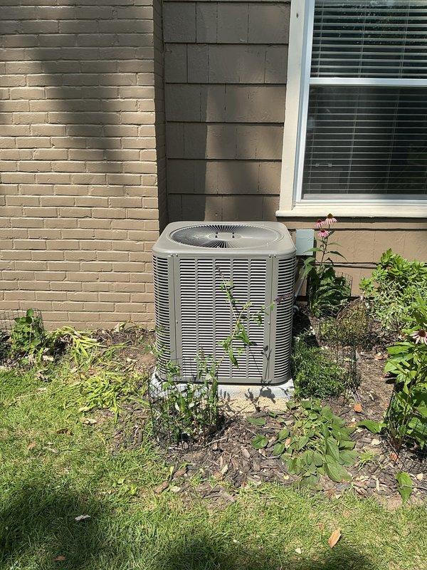 Completed full HVAC system installation including an 80% efficiency, 70,000 BTU upflow gas furnace with matching upflow cased evaporator coil. Installed new single-stage air conditioning condenser unit on concrete equipment pad with proper leveling, ran new 3/4-inch copper lineset approximately 50 feet from outdoor unit to indoor coil, and installed new electrical disconnect and whip for outdoor unit. Replaced existing thermostat with new unit and verified all equipment achieved proper AHRI certification match (215586645) for optimal system performance and manufacturer warranty compliance. All components tested and operational upon completion.