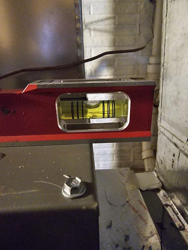 Completed installation of upflow 90% efficiency two-stage furnace rated at 110,000 BTU with dimensions 21" x 28" x 40" in basement utility area. Installed evaporator coil measuring 21" x 21" x 18" with required spacer for proper fitment, ensuring level placement and secure mounting to structural elements. Ran approximately 50 feet of 3-inch PVC venting system, properly pitched and terminated per manufacturer specifications and local code requirements. Installed new programmable thermostat and verified proper communication with two-stage heating operation. Completed all electrical connections, tested system operation through full heating cycles, and confirmed proper airflow through ductwork connections.