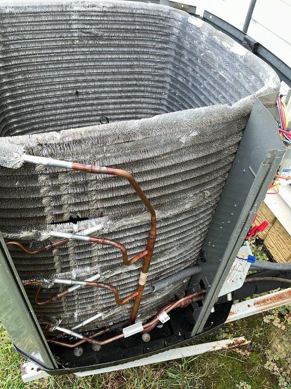 Responded to no cooling complaint on 120 SCAC unit. Upon inspection, found failed capacitor with visible rust and corrosion at base, along with heavily contaminated evaporator coil restricting airflow. Replaced defective capacitor and cleaned evaporator coil to restore proper system operation and cooling performance.