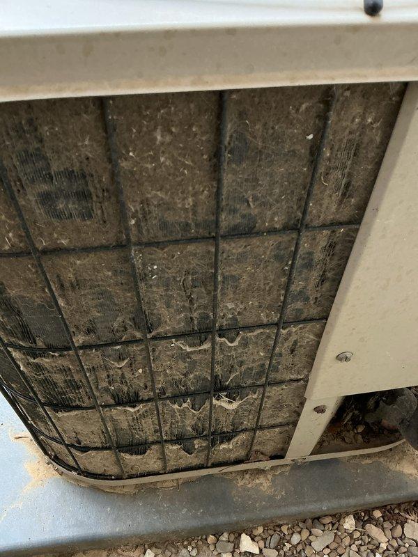 Completed cooling maintenance and tune-up on residential air conditioning system. Inspected outdoor condenser unit and found evaporator coil heavily soiled with accumulated dirt, dust, and debris restricting airflow. Cleaned coil assembly, checked refrigerant pressures using manifold gauges, and verified proper operation of all system components.