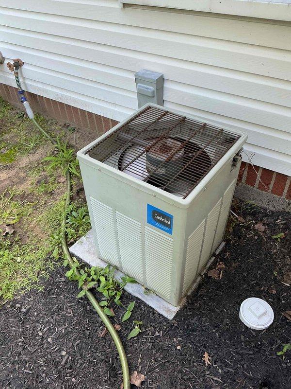 Completed comprehensive tune-up on 20+ year old residential air conditioning system. Performed standard maintenance protocol including inspection of outdoor condenser unit, refrigerant line set, electrical disconnect, and all accessible components. Unit operational at time of service completion.