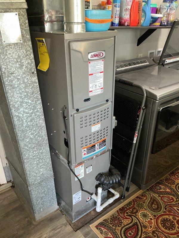 Responded to service call for condensate leak on recently installed Lennox HVAC system. Upon inspection, identified improper drainage from condensate line causing water leakage. Verified furnace and air conditioning unit were functioning properly otherwise. Corrected PVC condensate piping configuration to ensure proper drainage and prevent future leaks. System tested and confirmed operational with no further water discharge issues.