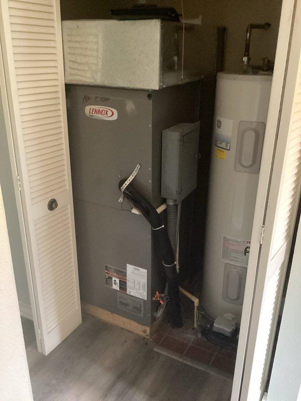Conducted on-site evaluation for mini split system installation to replace existing Lennox central air conditioning system. Assessed current equipment configuration including vertical air handler in interior utility closet and outdoor condensing unit positioned on concrete pad against exterior wall. Documented existing infrastructure including electrical disconnect, conduit routing, and equipment placement constraints. Photographed installation locations to determine optimal placement for mini split indoor and outdoor units, accounting for structural elements, utility connections, and clearance requirements. Provided comprehensive estimate for mini split system installation.