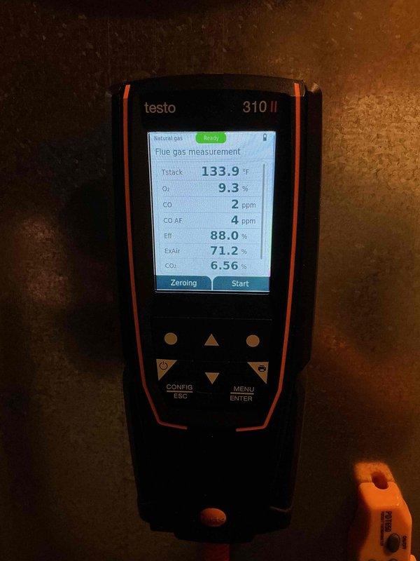Completed comprehensive tune-up service on both air conditioning and furnace systems, each approximately 12-14 years old. Performed combustion analysis on furnace using flue gas analyzer, confirming safe operation with CO reading of 2 ppm, efficiency at 88%, and oxygen level at 9.3%. Inspected outdoor AC unit manufactured in 2013, documenting equipment condition and verifying proper operation of both systems.