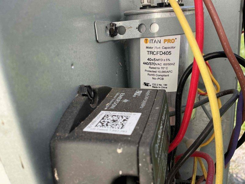Completed comprehensive tune-up service on residential HVAC system including air conditioning and gas furnace units. Performed full inspection of electrical components, verified proper operation of TITAN PRO 40+5 MFD dual run capacitor and contactor assembly, checked all electrical connections and wiring integrity. Inspected furnace cabinet, ductwork plenum, and air handler components to ensure system is operating efficiently and safely for the upcoming season.